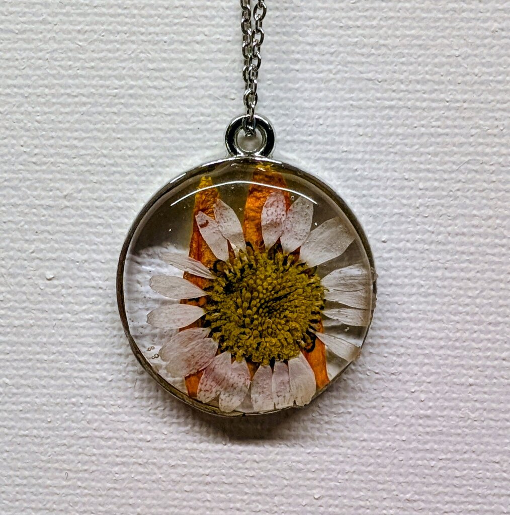White pressed Daisy with orange 15 inch stainless steel necklace