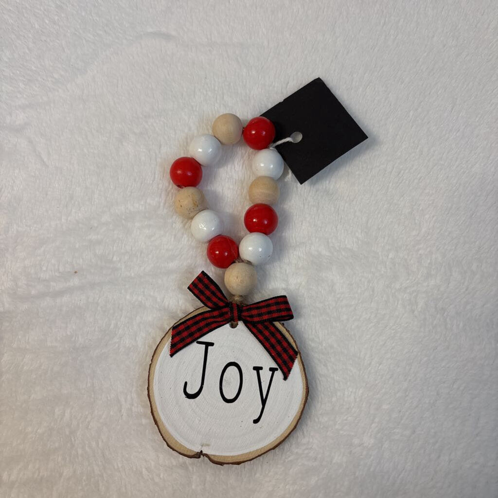 Red beaded wooden x mas tag