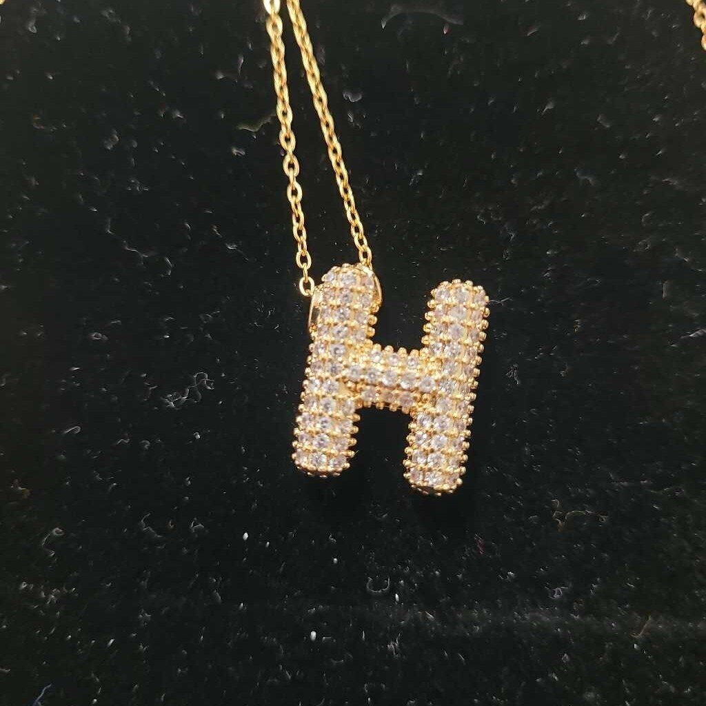 H INITIAL LETTER
