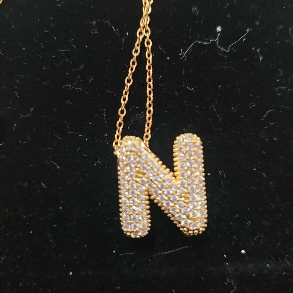 N INITIAL LETTER