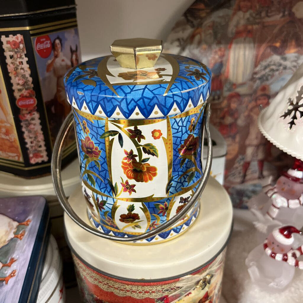 Blue flowered tin with handle