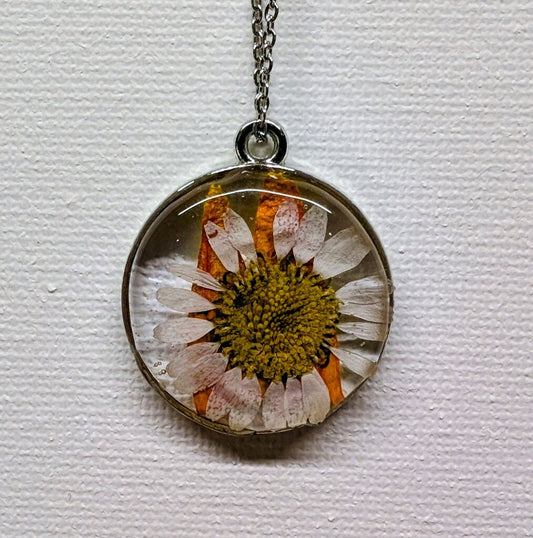 White pressed Daisy with orange 15 inch stainless steel necklace