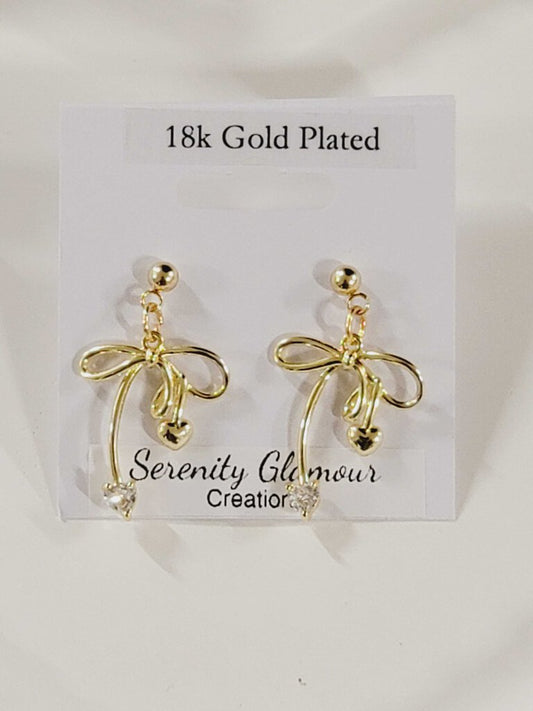 18k Gold Plated Dangling Bow with Heart Stones