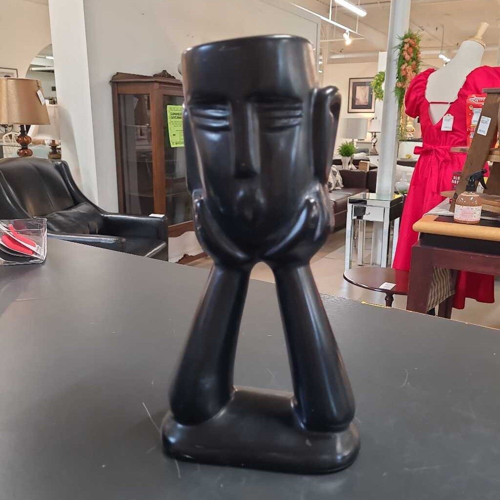 ABSTRACT HANDS HOLDING HEAD