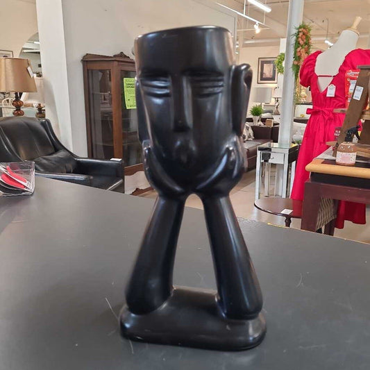 ABSTRACT HANDS HOLDING HEAD