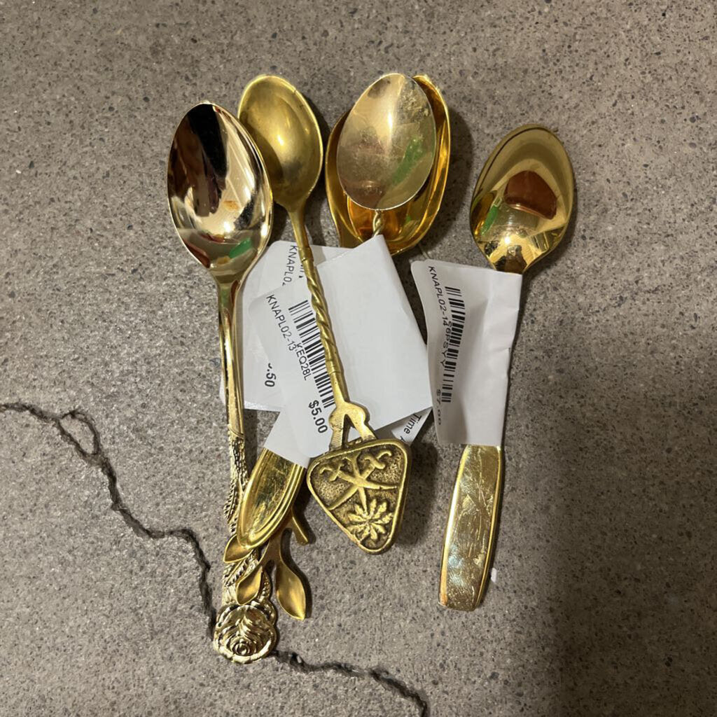 Brass teaspoon with swords