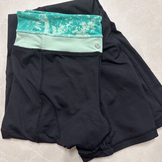 BLACK LULULEMON FLARE LEGGINGS WITH TEAL WAISTBAND