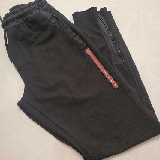 PRADA - MEN'S AUTHENTIC BLACK TAPERED NYLON SWEATPANTS