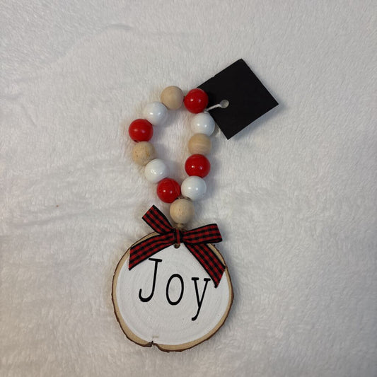 Red beaded wooden x mas tag