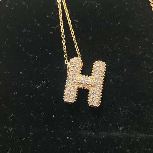 H INITIAL LETTER