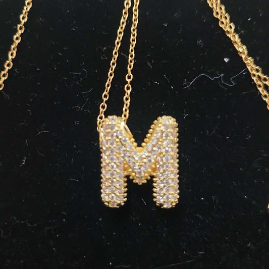 M INITIAL LETTER