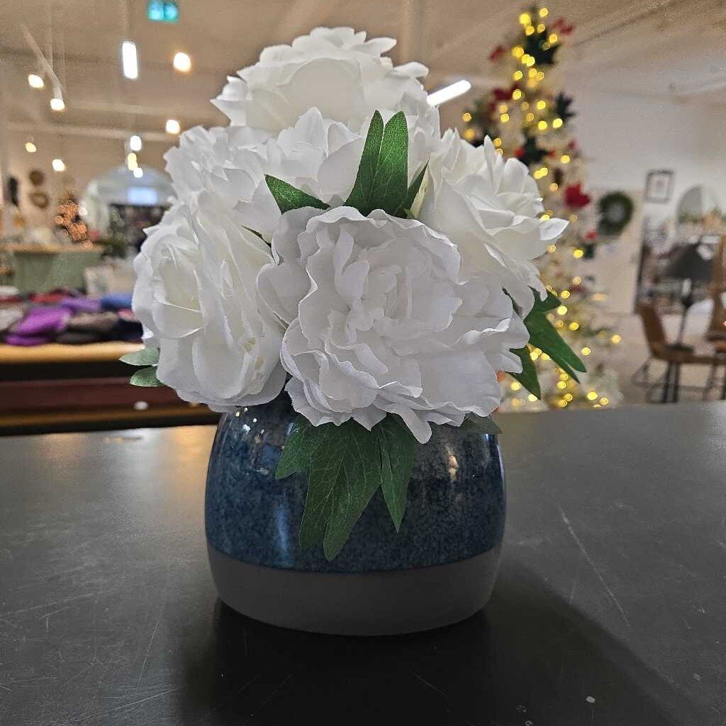 FAUX FLOWERS IN BLUE VASE