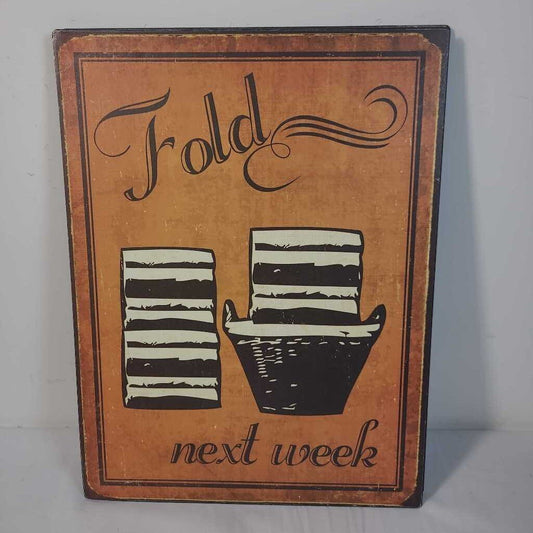 FOLD NEXT WEEK TIN SIGN