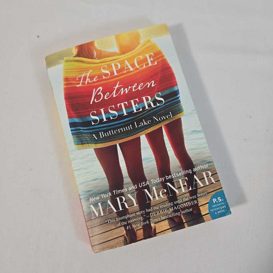 THE SPACE BETWEEN SISTERS - MARY MCNEAR