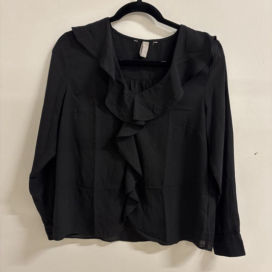 The "Raven" Cascading Ruffle Blouse