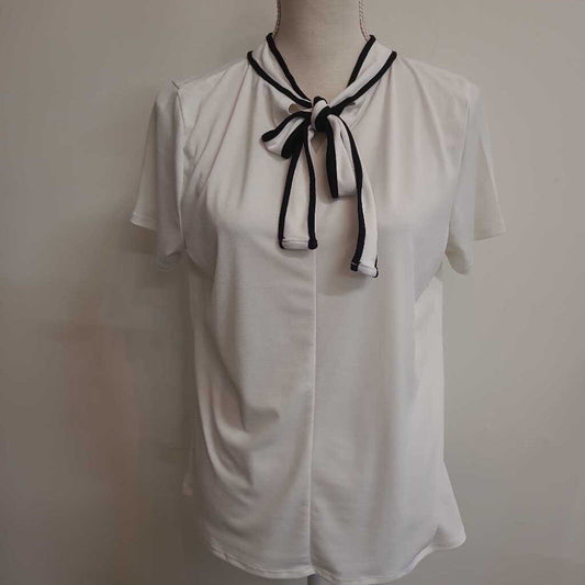 CREAM & BLACK TOP WITH BOW