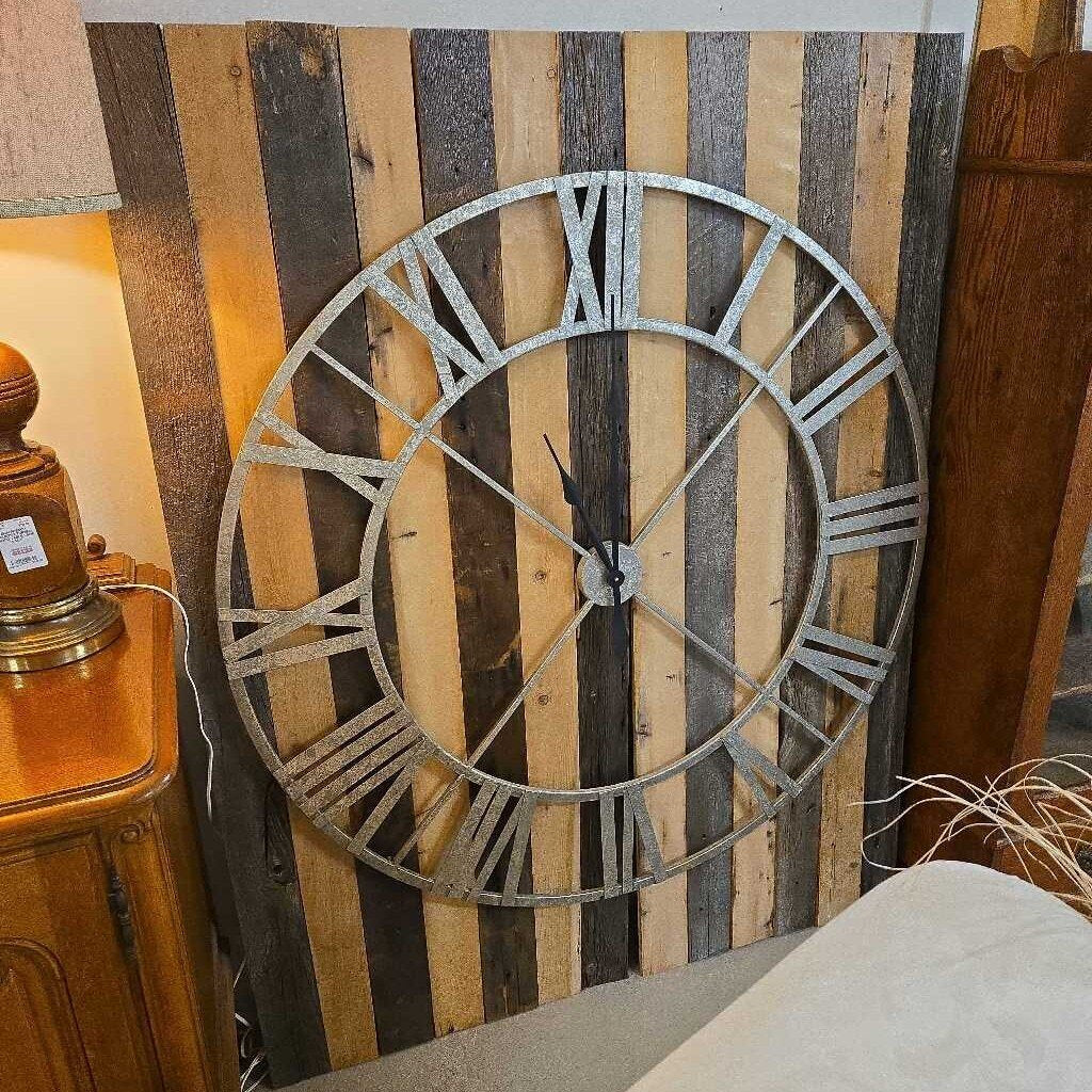 CLOCK ON WOODEN BACKING