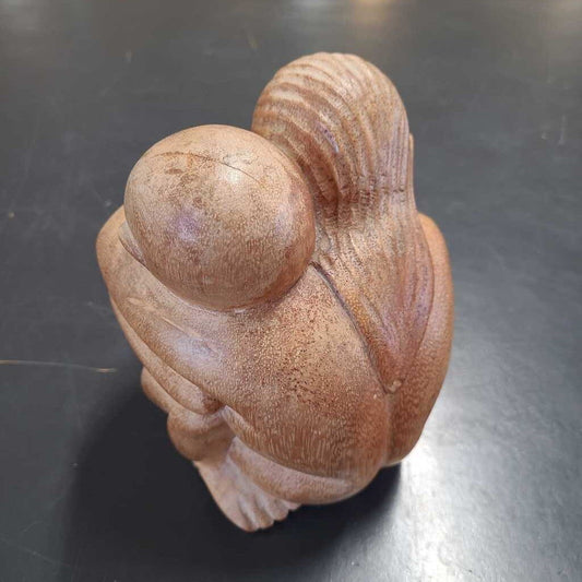 CARVED WOOD COUPLE HUGGING