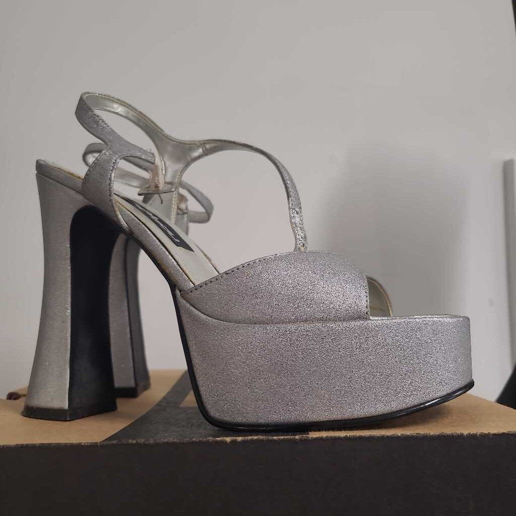 VINTAGE SILVER WEDGE HEELS