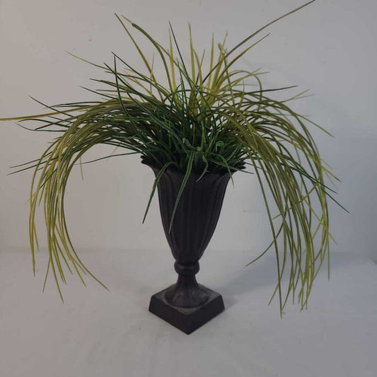 FAUX GRASS IN CAST IRON VASE