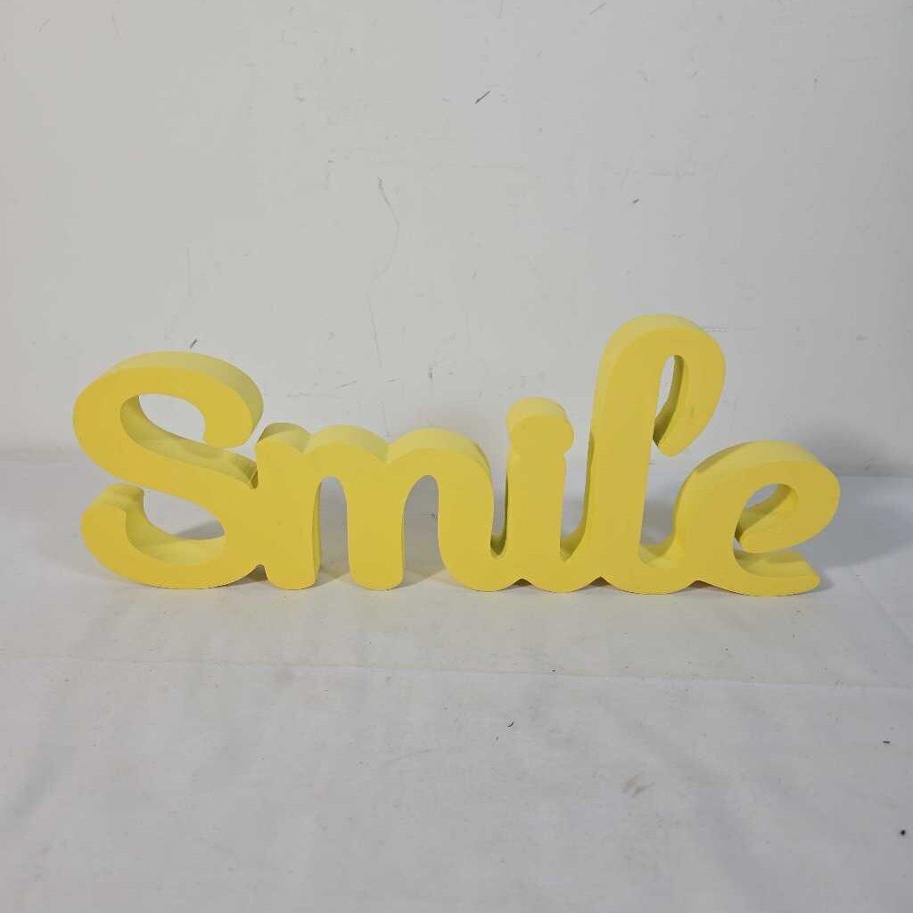 YELLOW SMILE SIGN