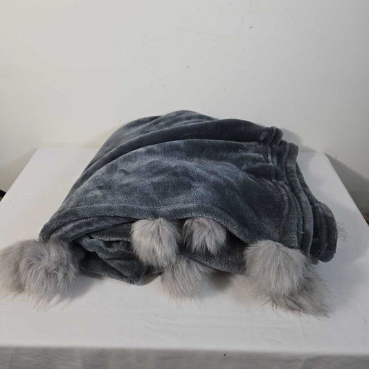 FUZZY THROW W/GREY POMPOMS