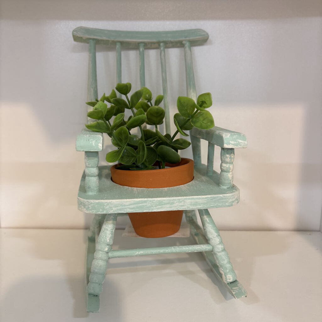 TEAL ROCKING CHAIR WITH PLANT