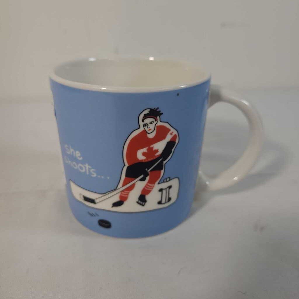 SHE SHOOTS.. SHE SCORES MUG