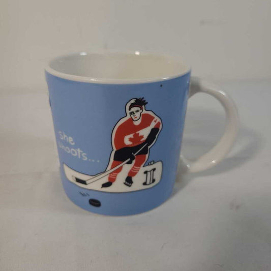 SHE SHOOTS.. SHE SCORES MUG