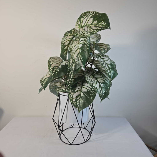 FAUX PLANT IN WHITE POT IN BLACK STAND