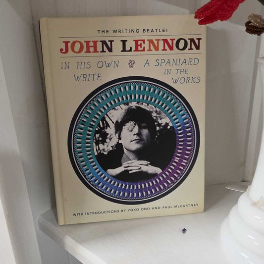 BOOK - JOHN LENNON IN HIS OWN WRITE AND A SPANIARD IN THE WORKS 2010