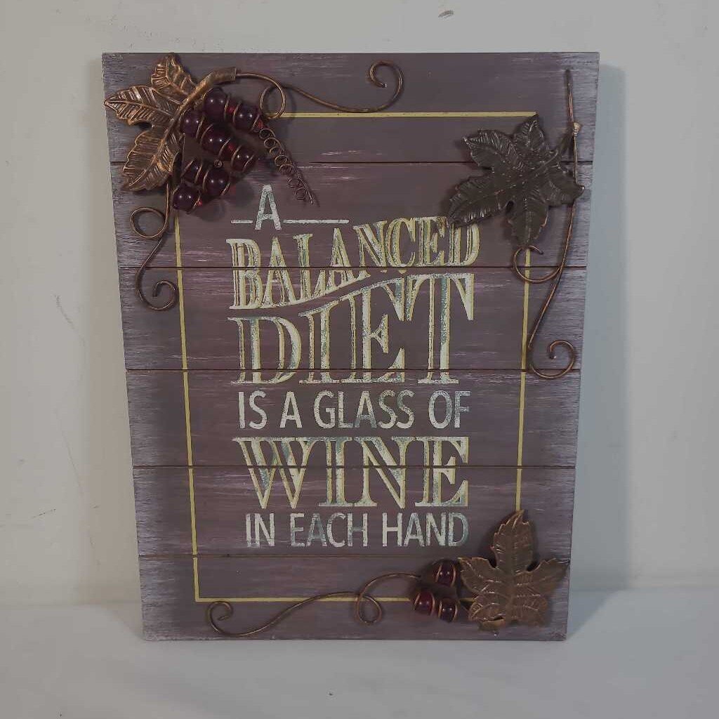 A BALANCED DIET IS A GLASS OF WINE