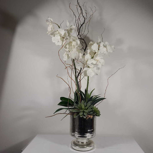 FAUX ORCHIDS IN DIMPLED SILVER POT